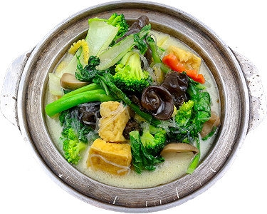 Vegan vegetables mix with tofu and vermicelli with broth